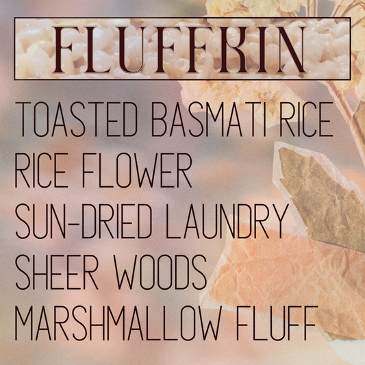 A fragrance product image for niche perfume 'Fluffkin' by indie perfume house Mythpunk Olfactive with listed scent notes including toasted basmati rice, rice flower, sun-dried laundry, sheer woods, and marshmallow fluff over a layered background of a blurred, grey and coral gradient with collage paper cut-outs and a stem holding branches of clustered fluffy shea blossoms.