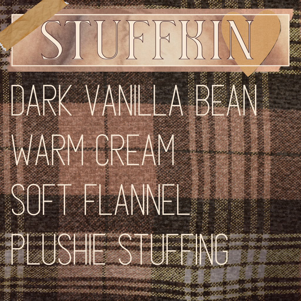 A fragrance product image for niche perfume 'Suffkin' by indie perfume house Mythpunk Olfactive with listed scent notes including dark vanilla bean, warm cream, soft flannel, and plushie stuffing, over a stylized flannel background with collage cut-outs of washi tape and a paper heart.