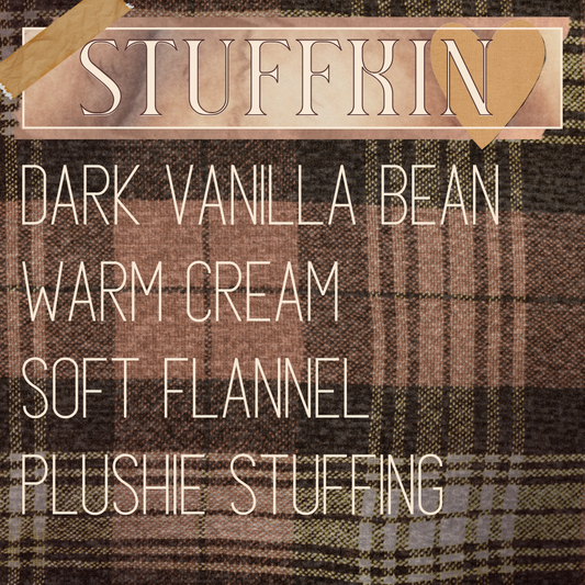A fragrance product image for niche perfume 'Suffkin' by indie perfume house Mythpunk Olfactive with listed scent notes including dark vanilla bean, warm cream, soft flannel, and plushie stuffing, over a stylized flannel background with collage cut-outs of washi tape and a paper heart.